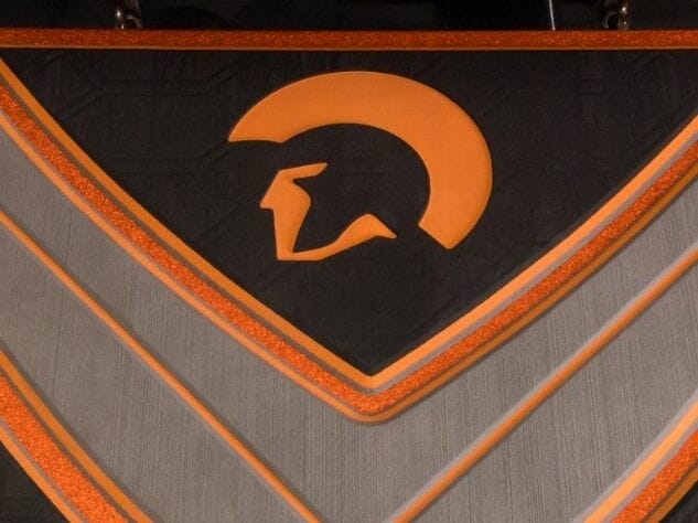 A spartan logo banner.