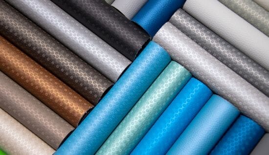 Different colors of carbon fiber fabric for a wakesurf boat.