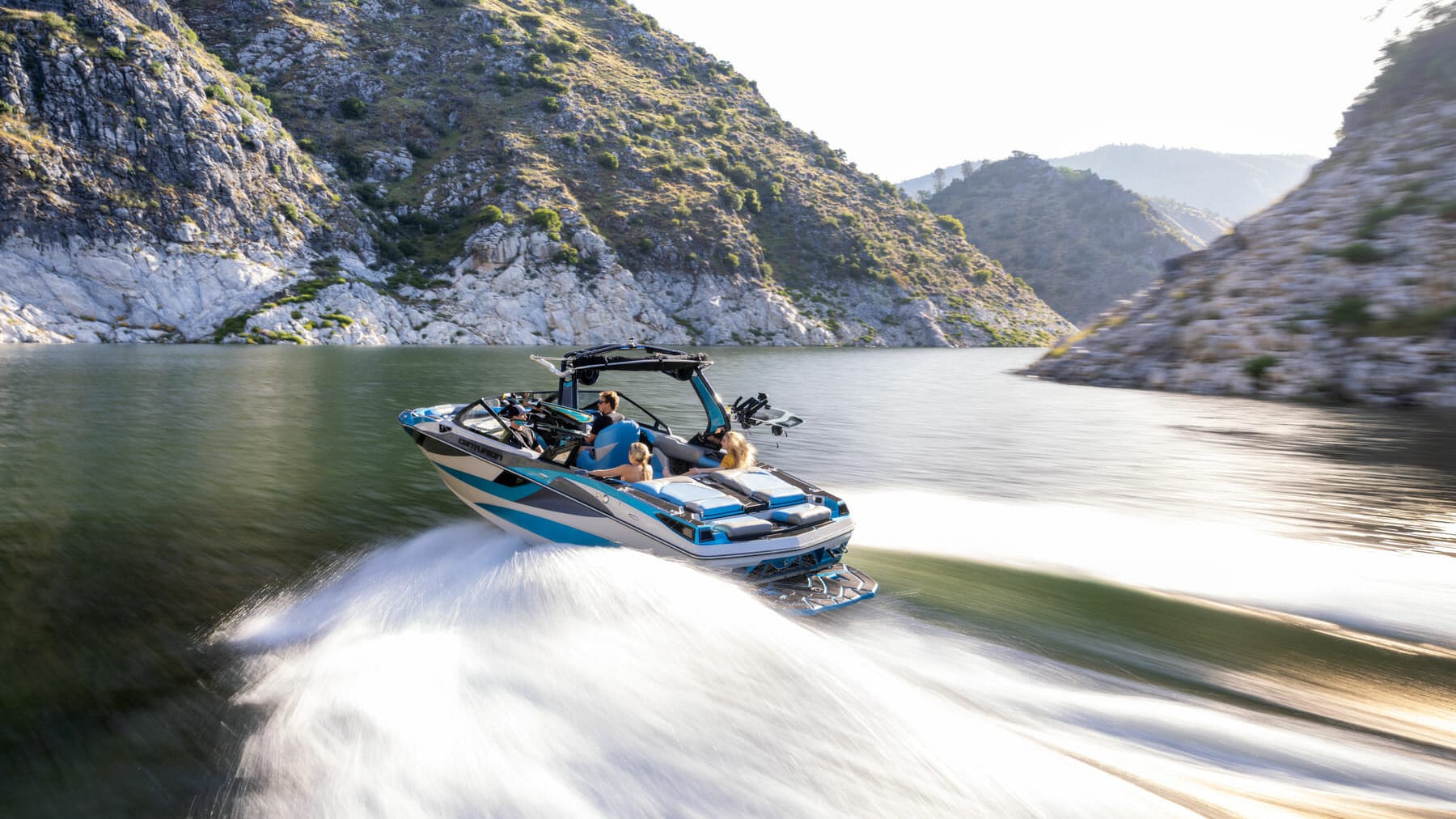 A person is riding a jet ski on a river.