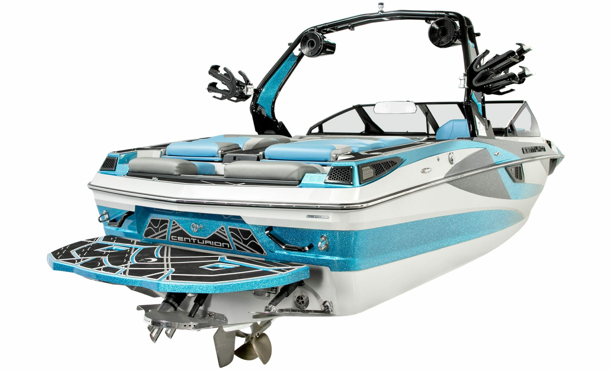 A wakeboat with a blue and white design.