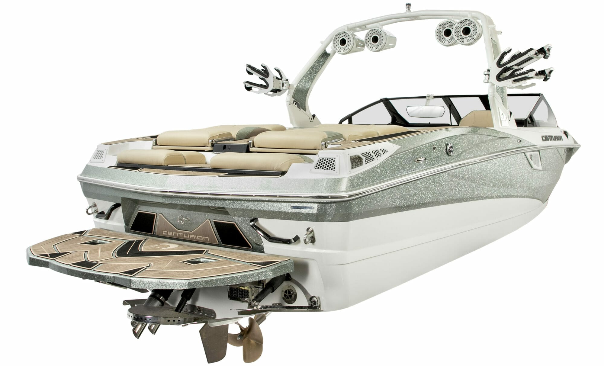 A white and silver wakesurf boat with two seats on it.
