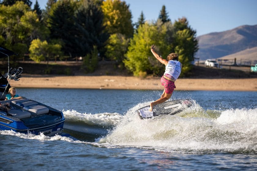 A man is wakeboarding.