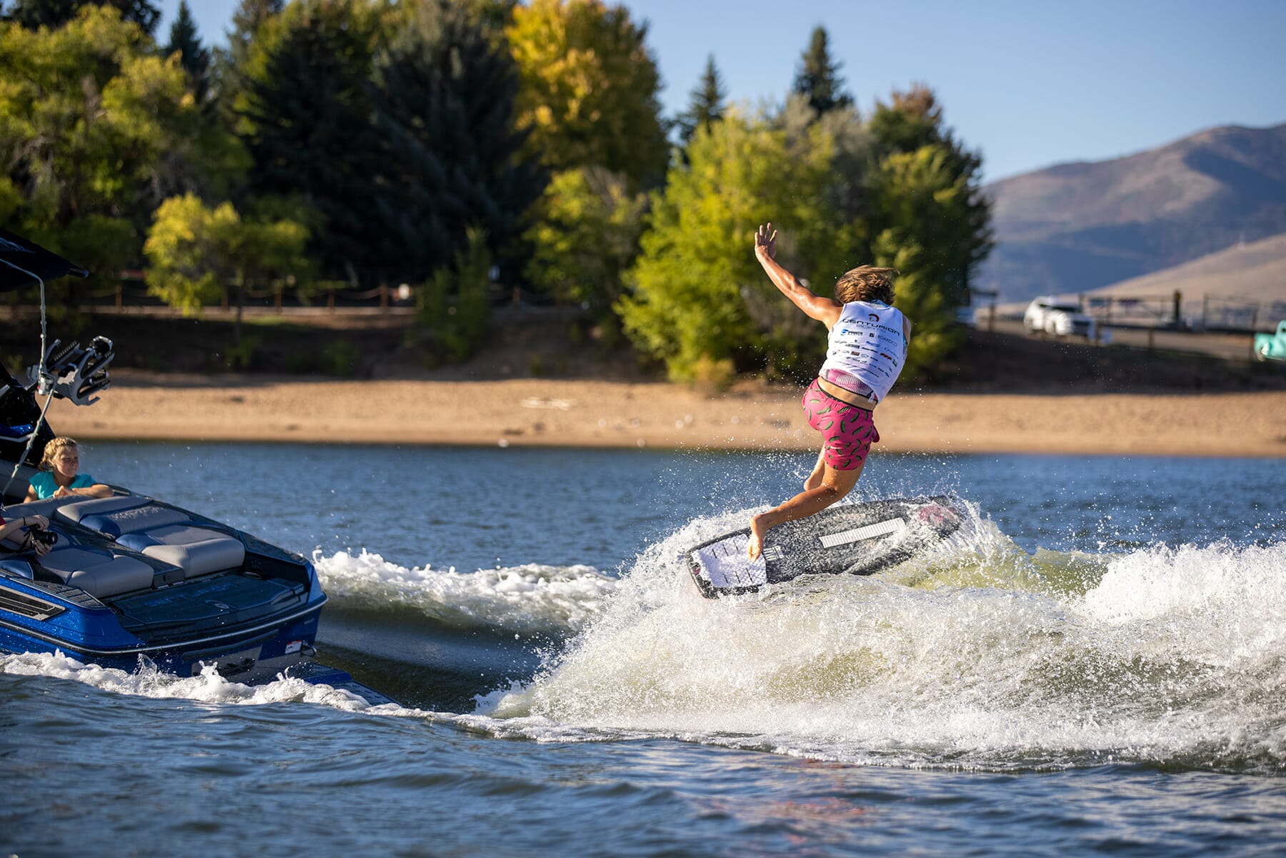 A man is wakeboarding.