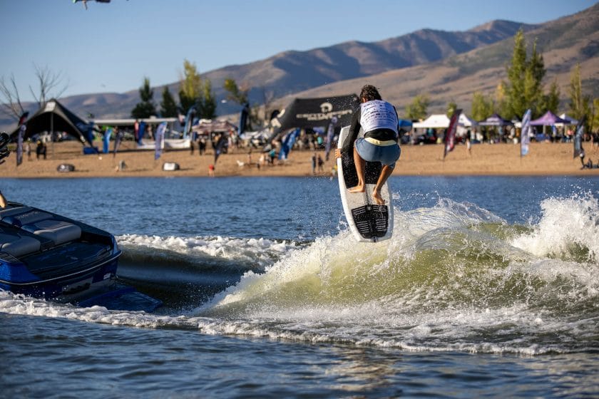 2024 WWSC Day 2 Recap: Surfer riding a surfboard in the water.