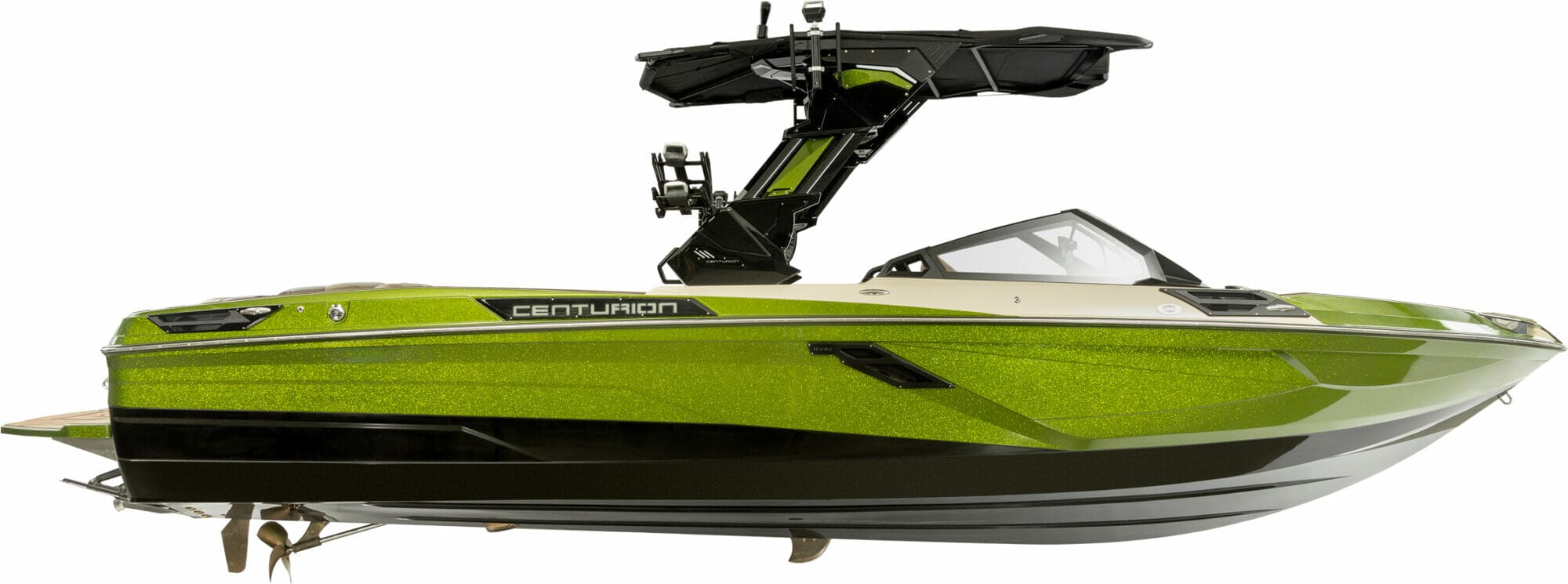 A green wakesurf boat with a motor attached to it.
