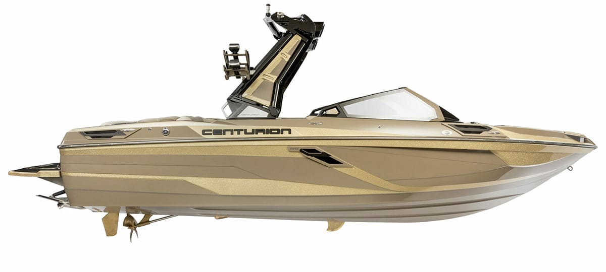 A gold Centurion boat with a sleek design featuring a raised tower and seating area. The 2024 model is shown on a white background, fully equipped with modern amenities for water activities.